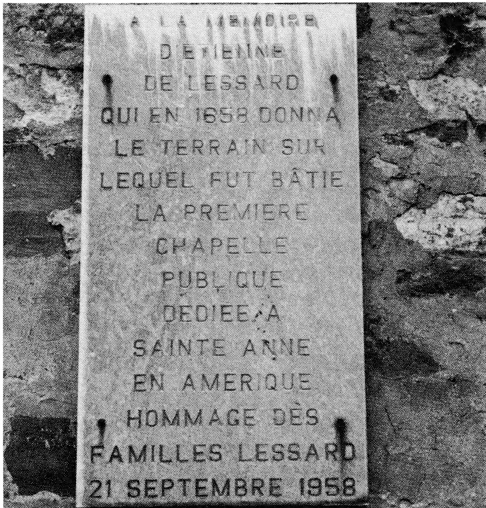 Close-up photograph of a stone plaque with French text commemorating Etienne de Lessard.