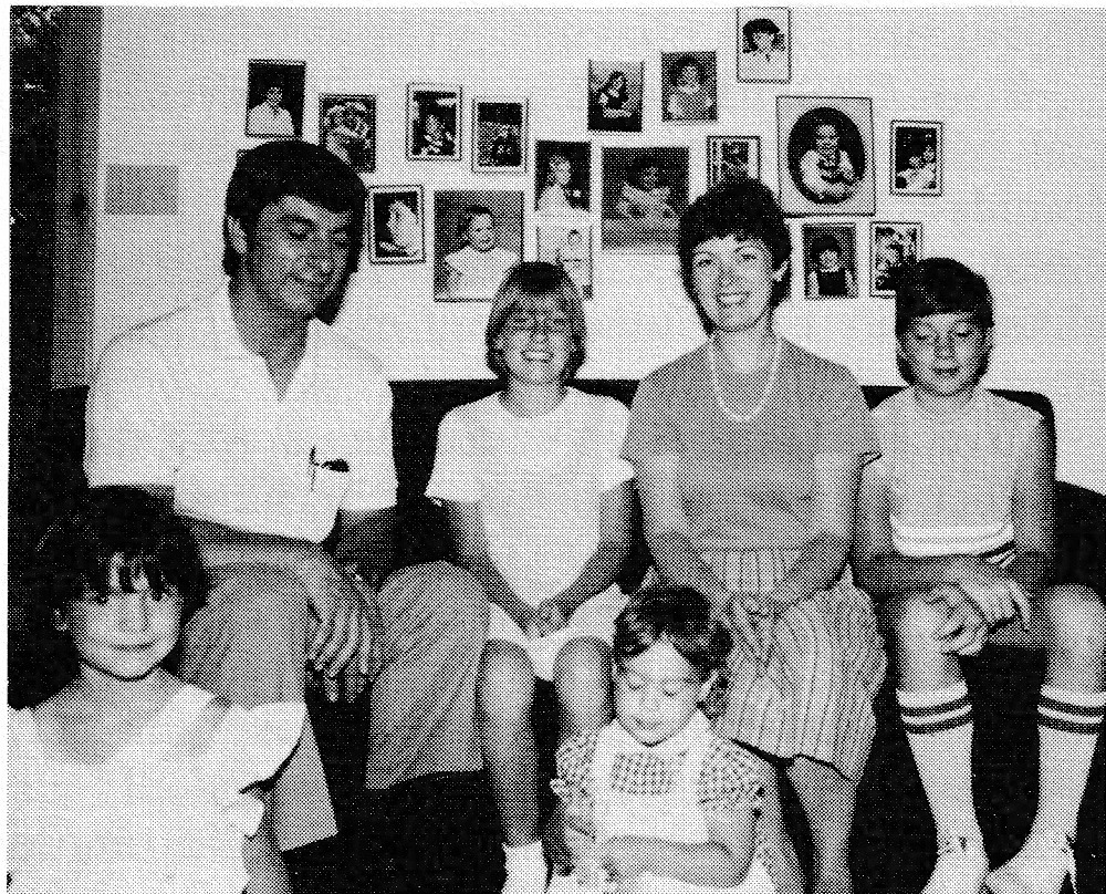 Family photo of Tom, Robin, and their children