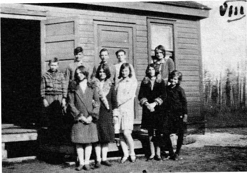 Man and woman standing in front of a building
